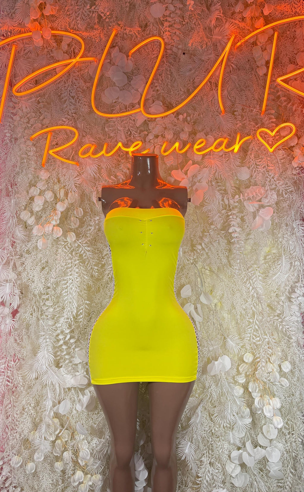 Neon yellow strapless mini dress with bodycon fit, straight neckline