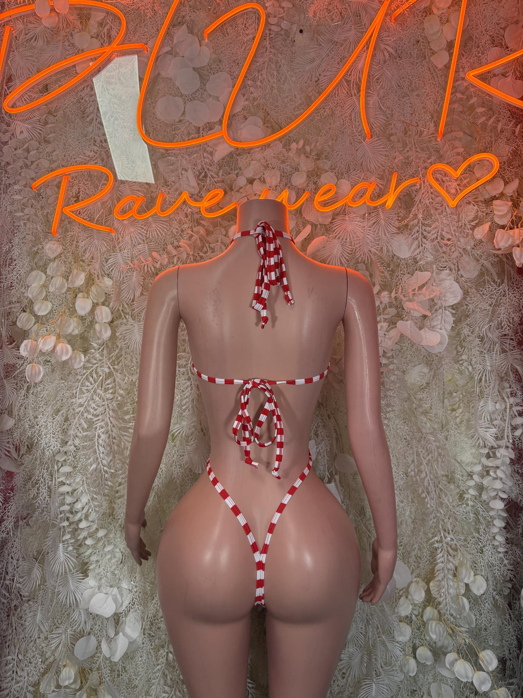 Red and white check candy-cane bodysuit with crisscross back ties and thong front