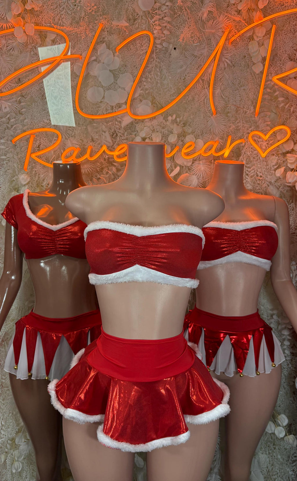 Santa skirt set with red strapless crop top and flared red mini skirt, white trim