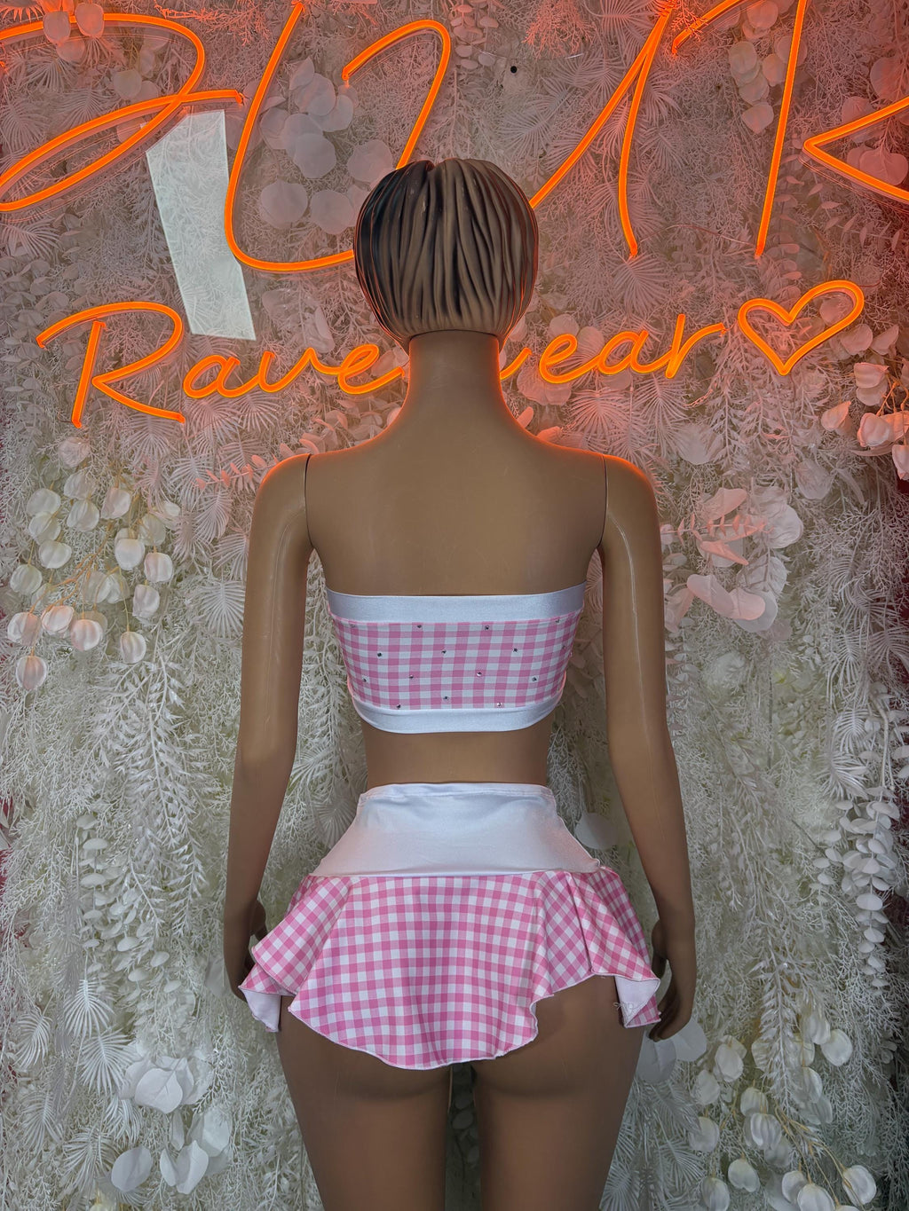 Pink gingham two-piece skirt set with strapless bandeau top and pleated back mini skirt