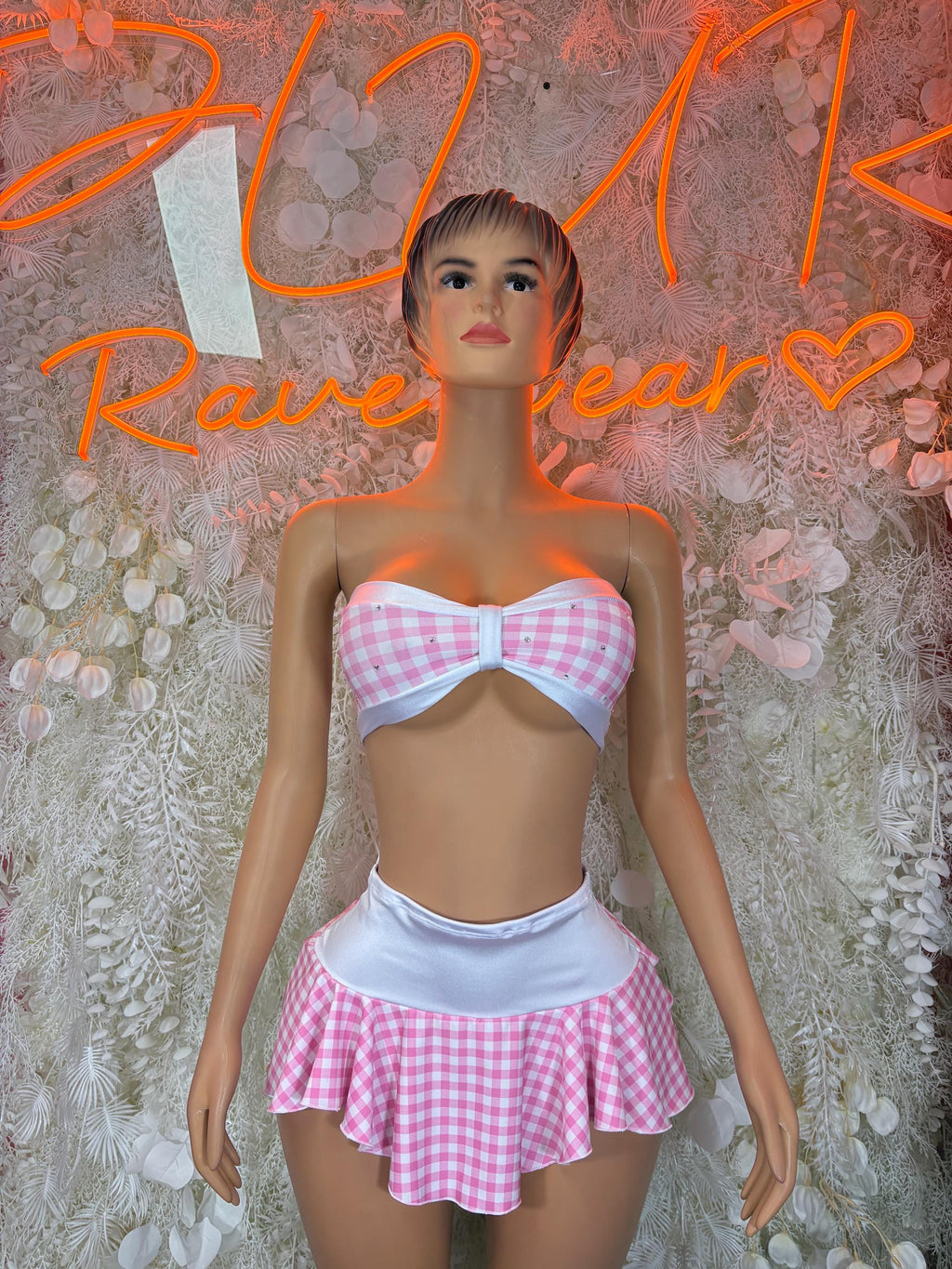 Pink gingham two-piece schoolgirl skirt set with strapless top and pleated mini skirt