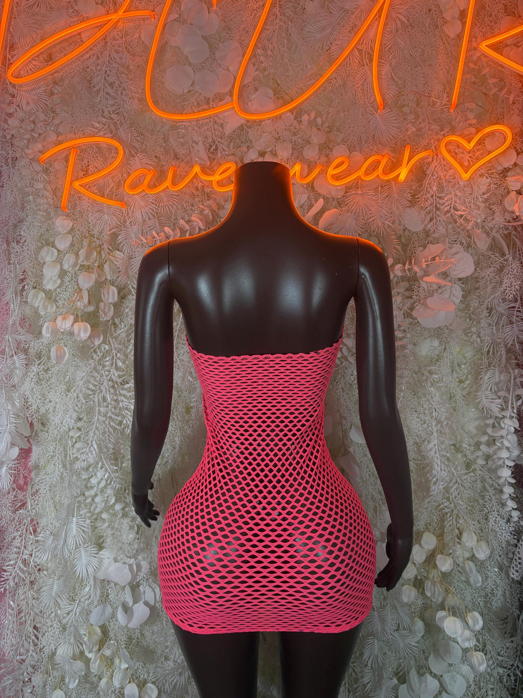 Pink fishnet mini dress with strapless back and crisscross mesh pattern