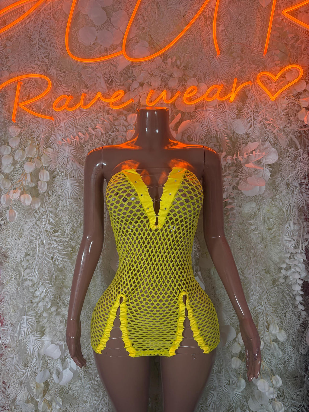 Yellow fishnet mini dress with V-neck and high-cut sides, sleeveless