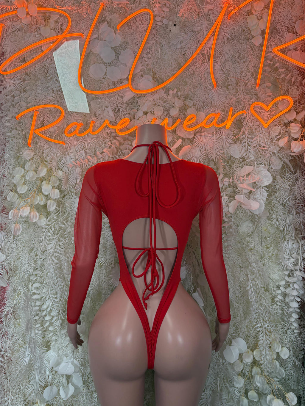 Red Santa bodysuit costume, sheer long sleeves, open back with lace-up cord detail