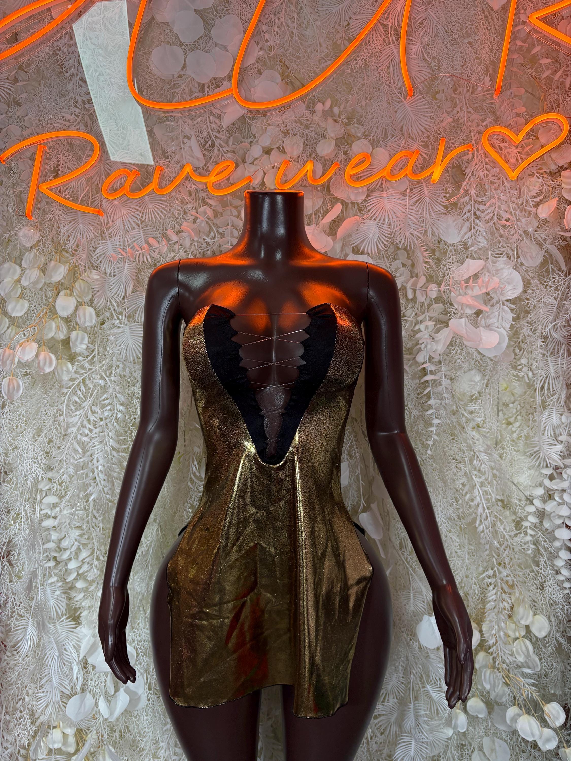 Gold metallic club dress with long sleeves and butterfly cutout front