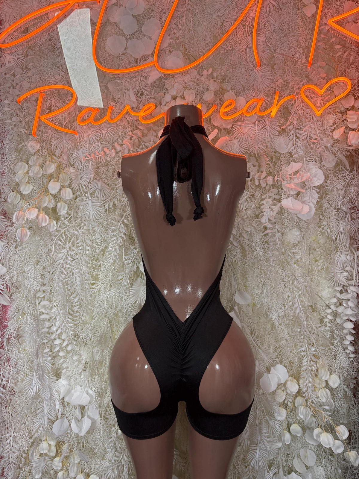 Metallic bodysuit with low back and deep V-front, high-cut leg, back view