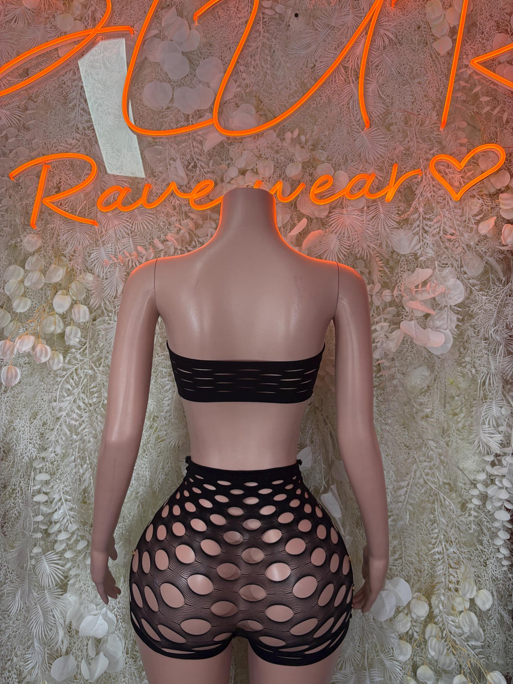 Black fishnet two-piece set with bandeau top and high-waist shorts