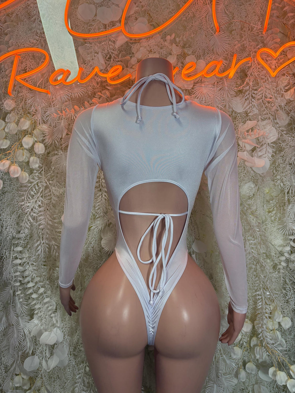 Holographic silver cheetah print rave bodysuit with open back and crisscross tie