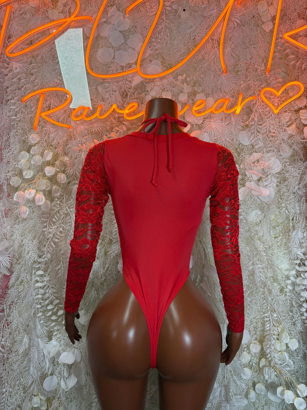 Red lace long-sleeve bodysuit with open back and neck tie
