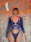 Blue lace bodysuit with crisscross straps and low V neckline