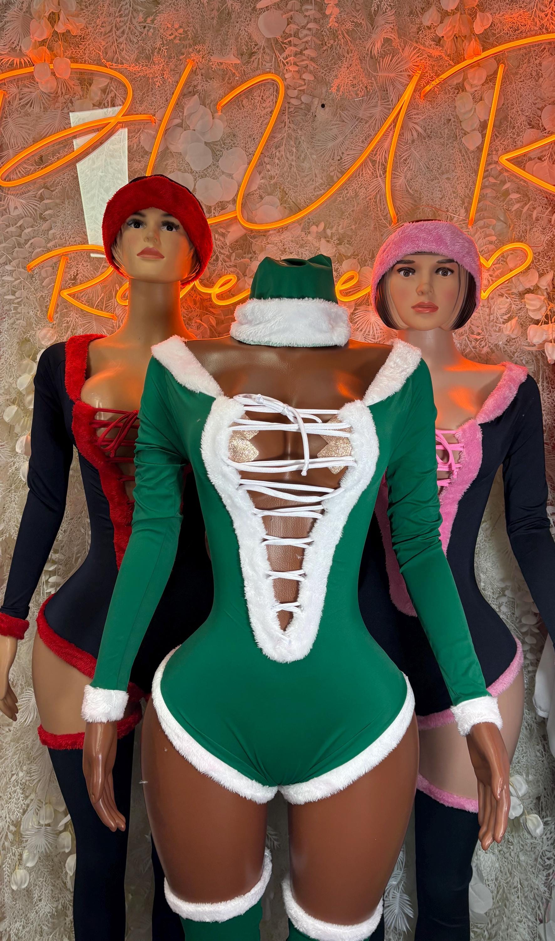 Pink elf bodysuit with white lace-up front, long sleeves, and matching hat