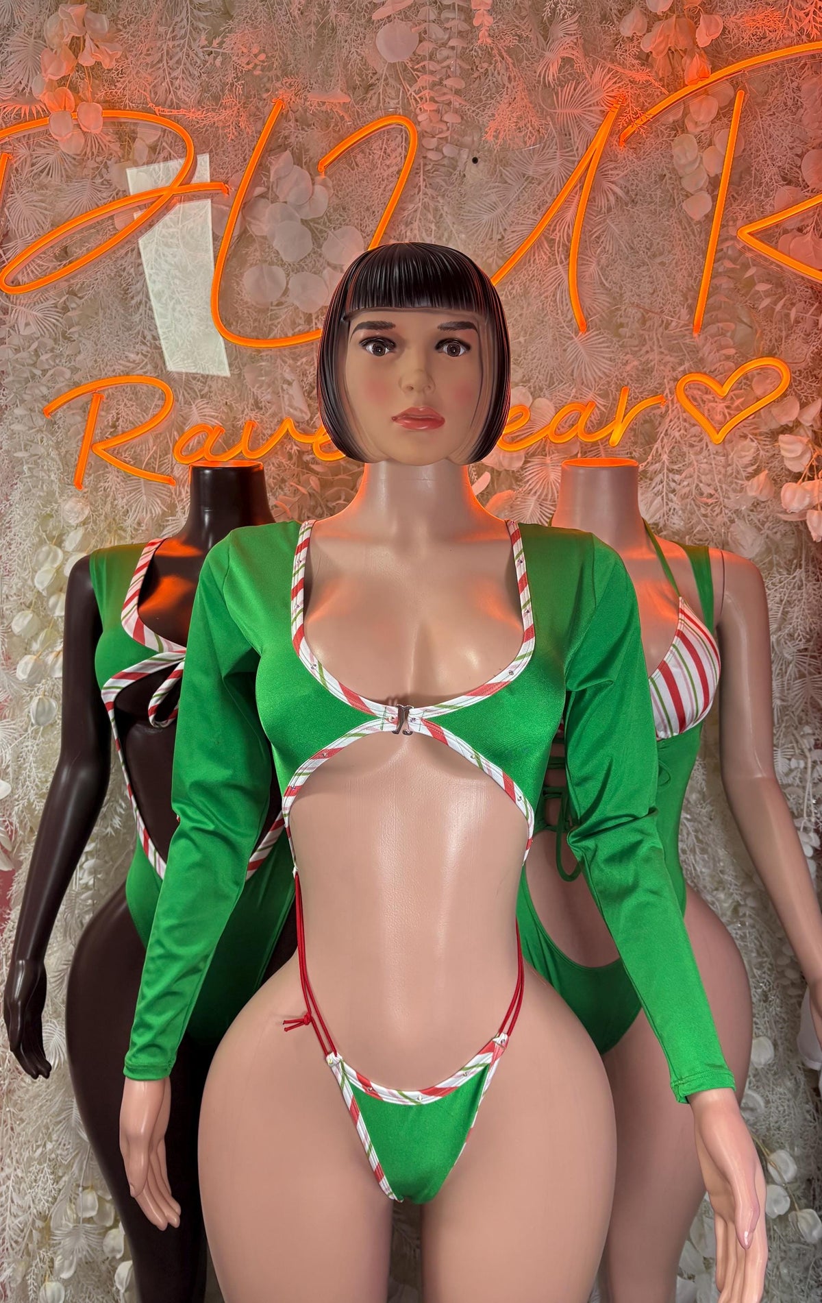 Green long-sleeve Christmas bodysuit with striped shoulder panels and low-cut neckline