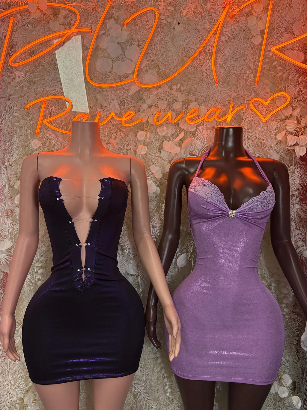 Two metallic mini dresses: dark purple corset style and lavender sleeveless sweetheart