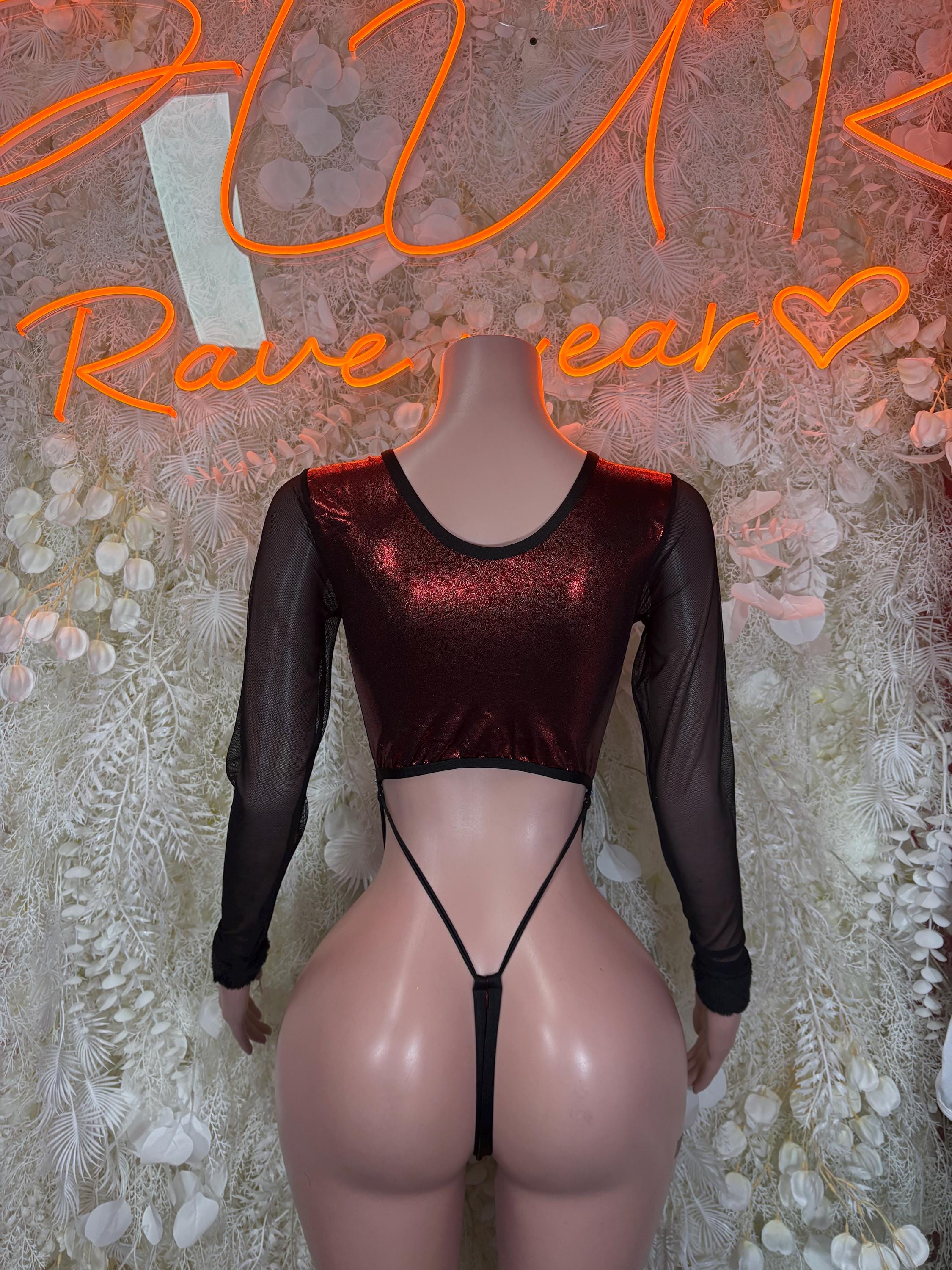 Burgundy and dark one-piece dancewear with long sheer sleeves, bandeau top, thong