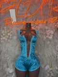 Light blue bodysuit with deep front cutout and corset-style lace-up back