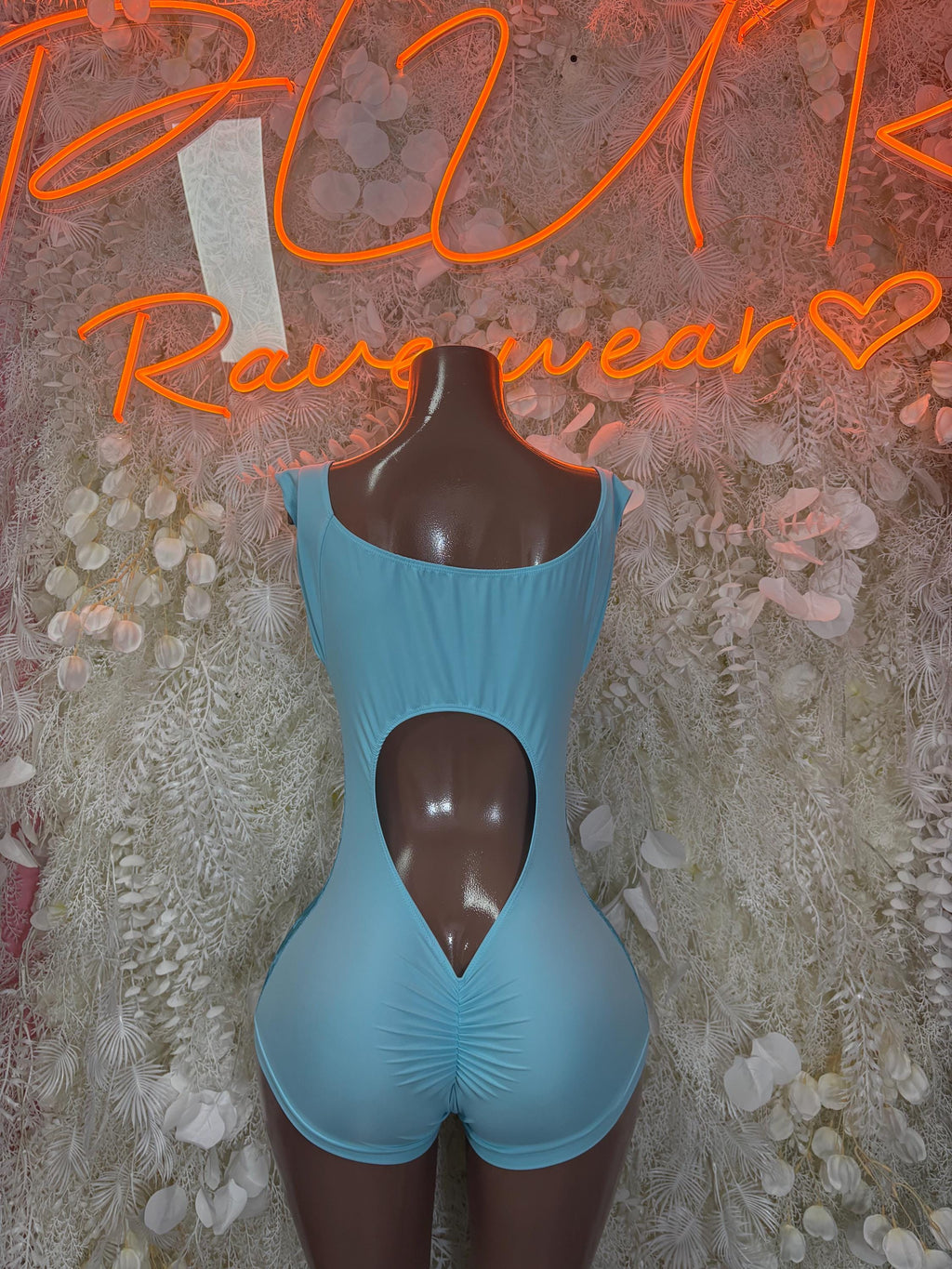 Light blue sleeveless bodysuit romper with sweetheart neckline and center cutout