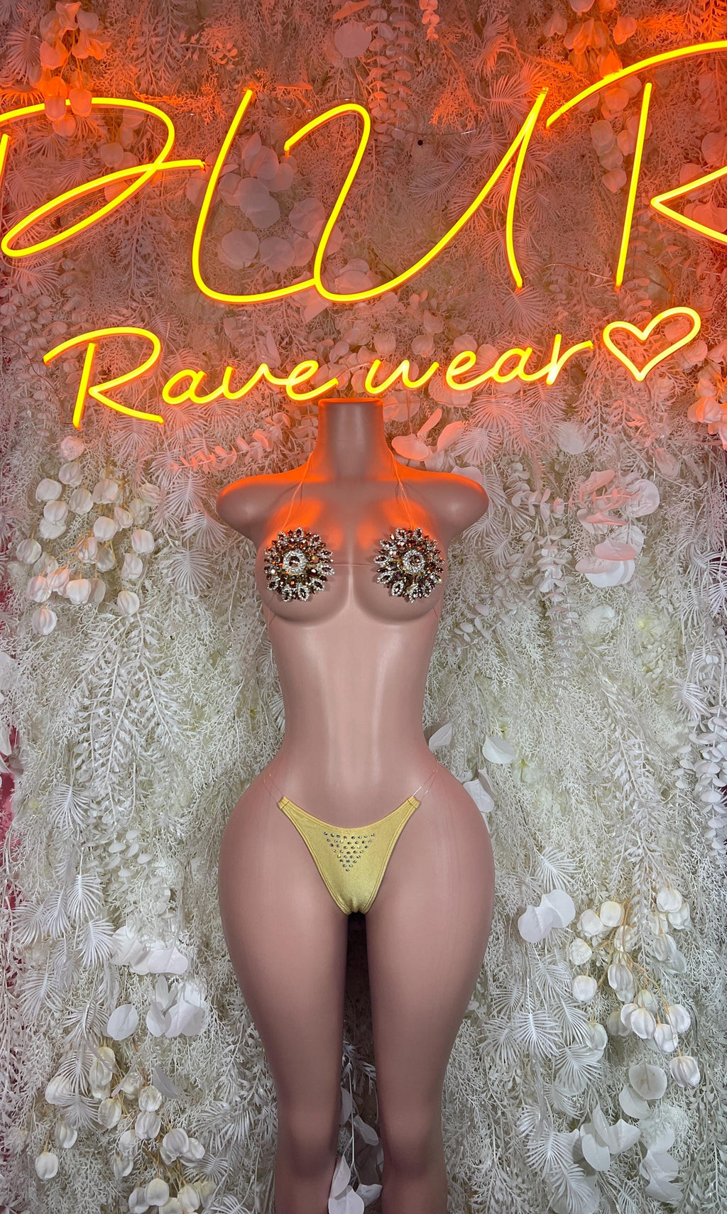 Rhinestone bikini set on mannequin, yellow triangle bottoms with sparkly jeweled cups
