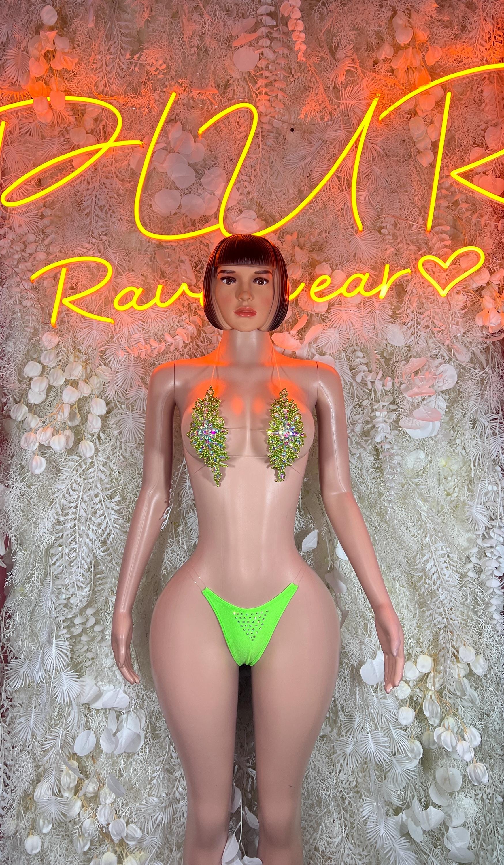 Green rhinestone rave bikini set with triangle top and high-cut bottoms.