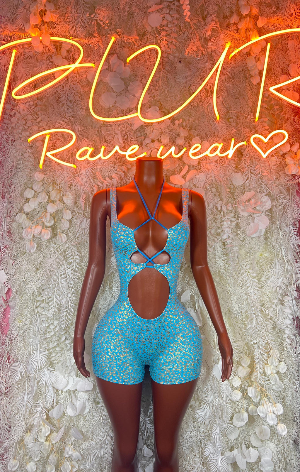 Teal cheetah-print bodysuit with halter neckline and cutout thigh panels