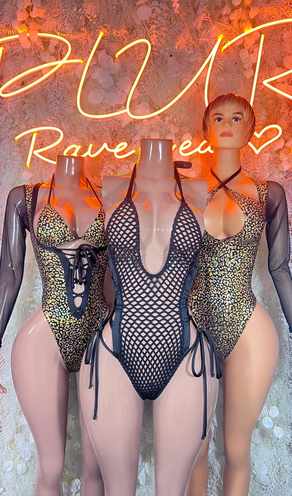Cheetah print bodysuit with lace-up V neckline, long sheer sleeves