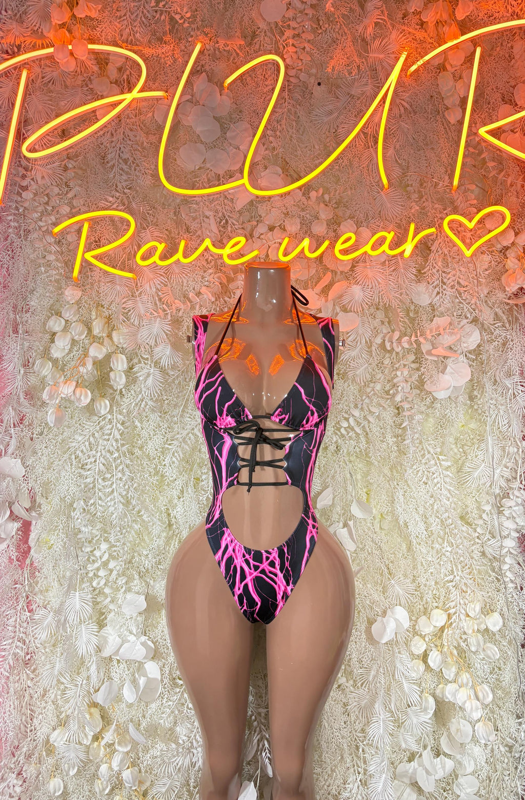 Rave bodysuit with purple-pink lightning print and crisscross lace-up front