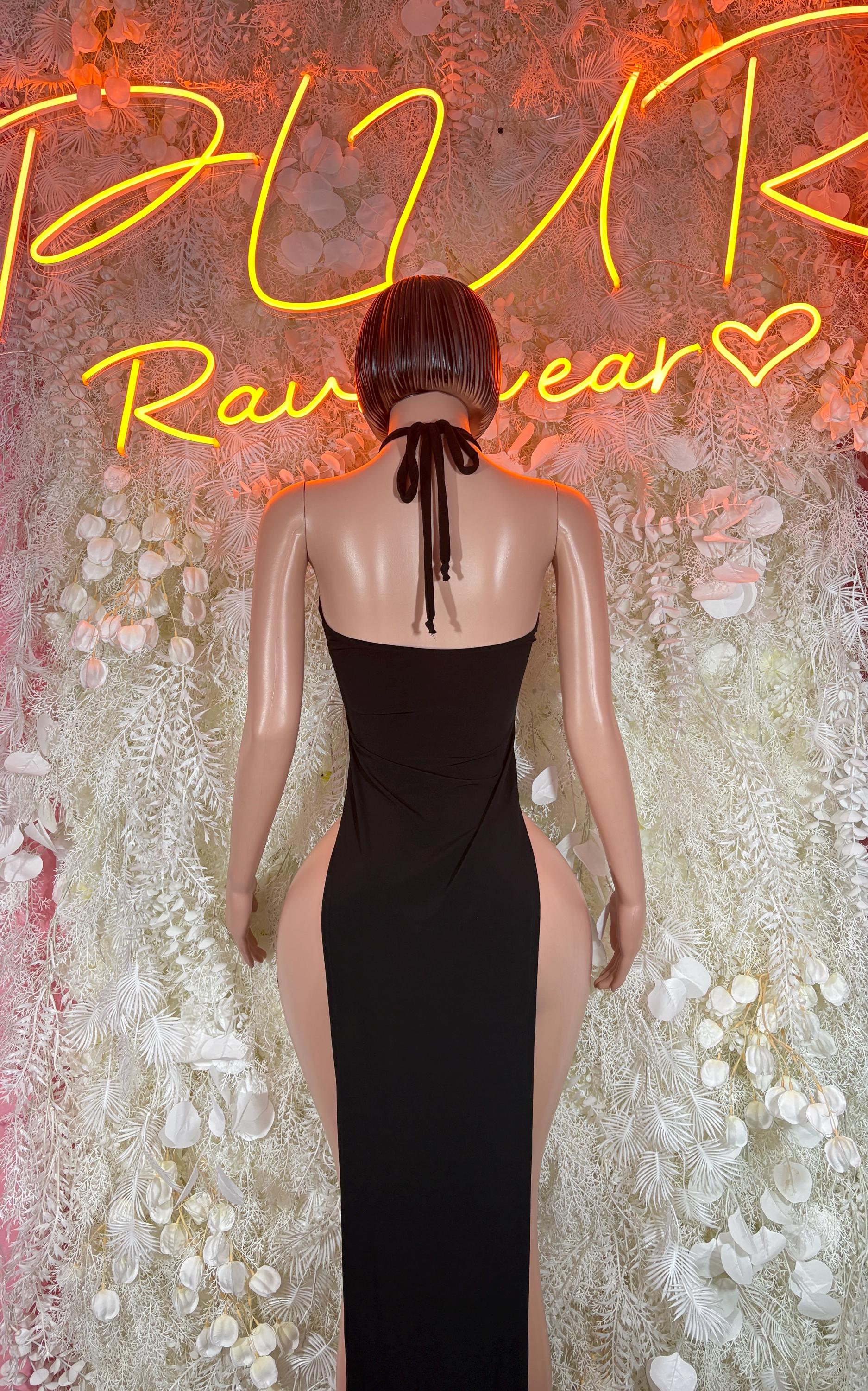 Black dance gown back view with tie at neck and low back