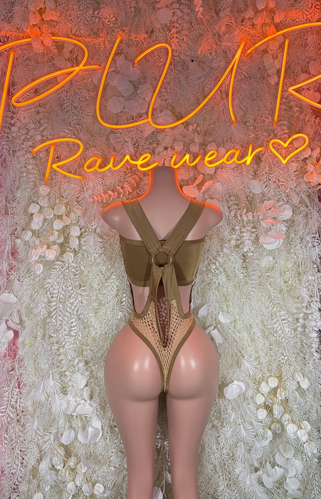 Gold fishnet bodysuit with cross-back straps and thong-style backless fit