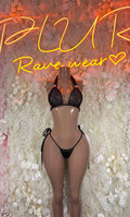 Black lace strappy bikini set on mannequin, triangle cups and adjustable tie bottoms