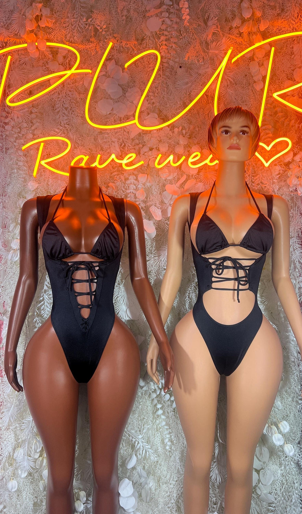 Black one-piece bodysuit, front and back views on models, lace-up waist