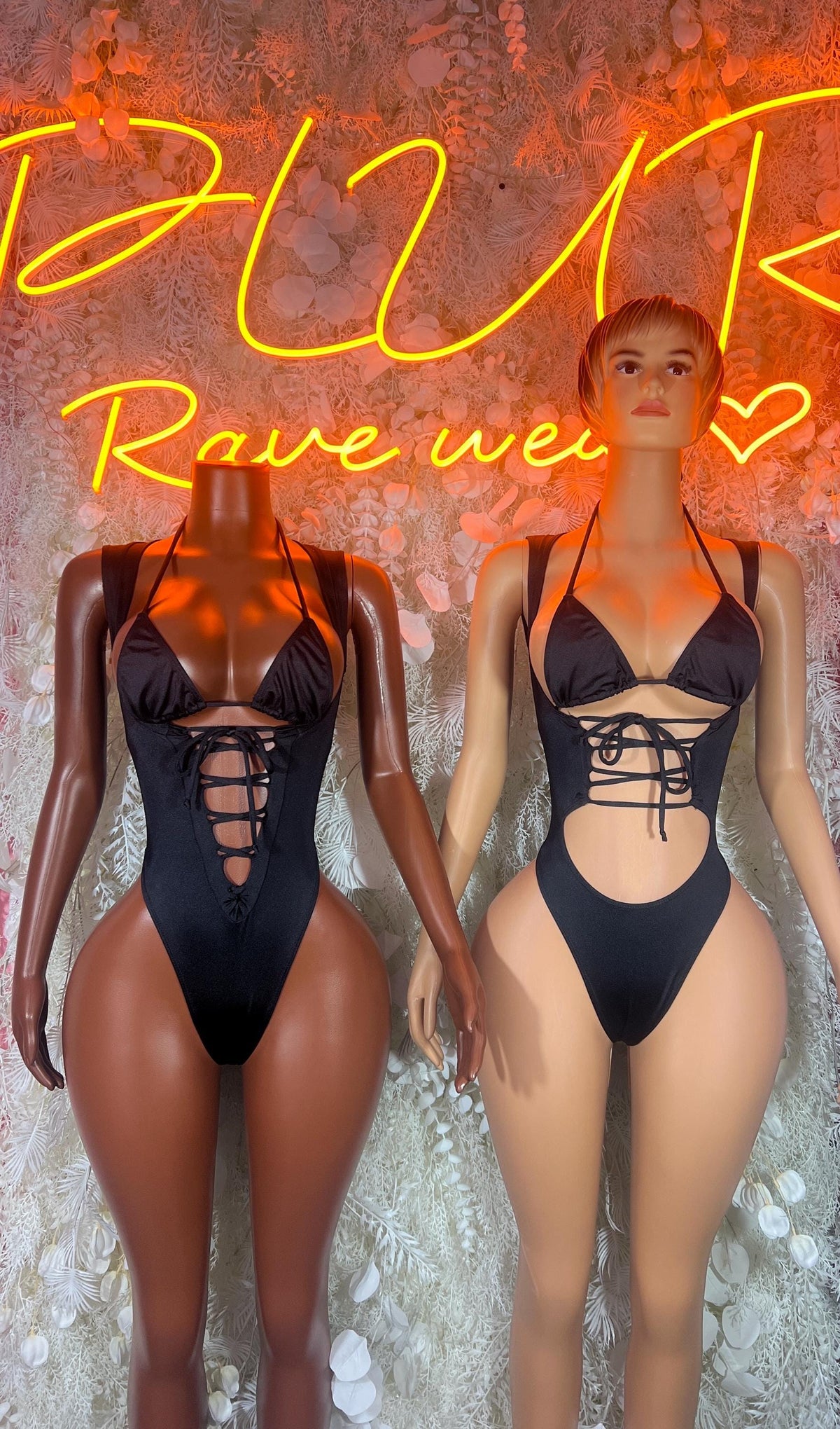 Black one-piece bodysuit, front and back views on models, lace-up waist