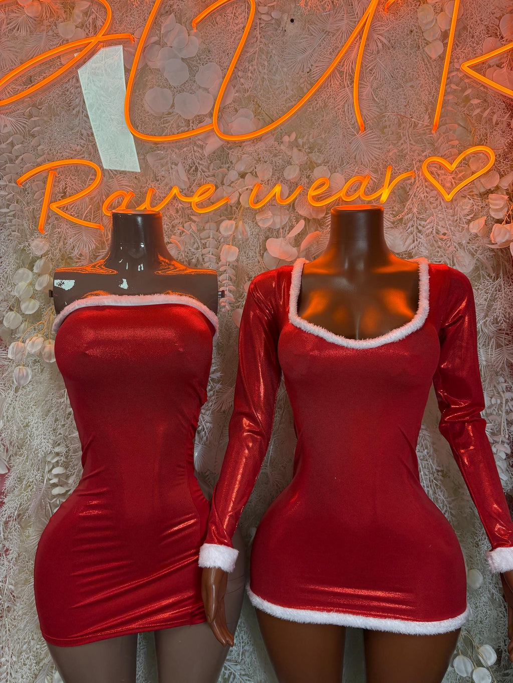 Red satin mini dress with white faux fur trim, long sleeves, fitted bodycon