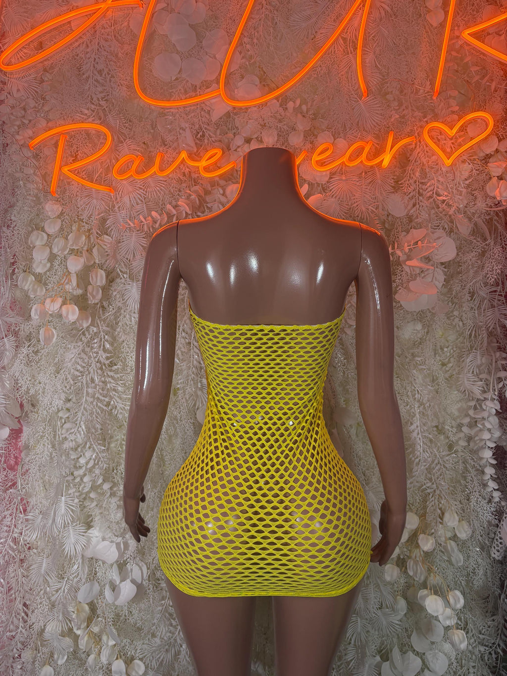 Yellow fishnet mini dress with V-back and scoop neckline, sleeveless