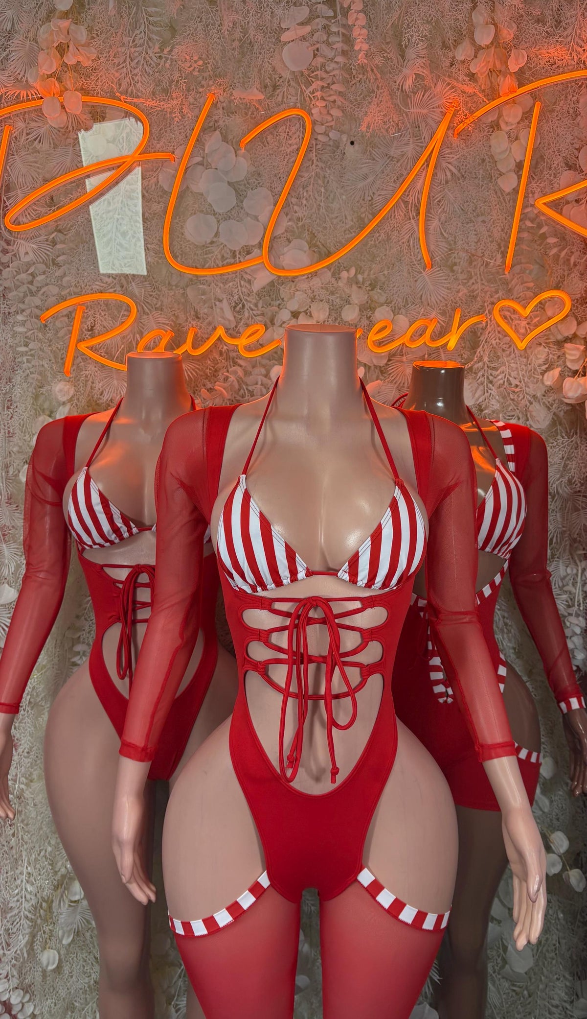 Red Santa bodysuit costume with white striped bra cups, ribbon lace-up front and trim