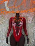Red Santa-style bodysuit with white striped cups and lace-up front