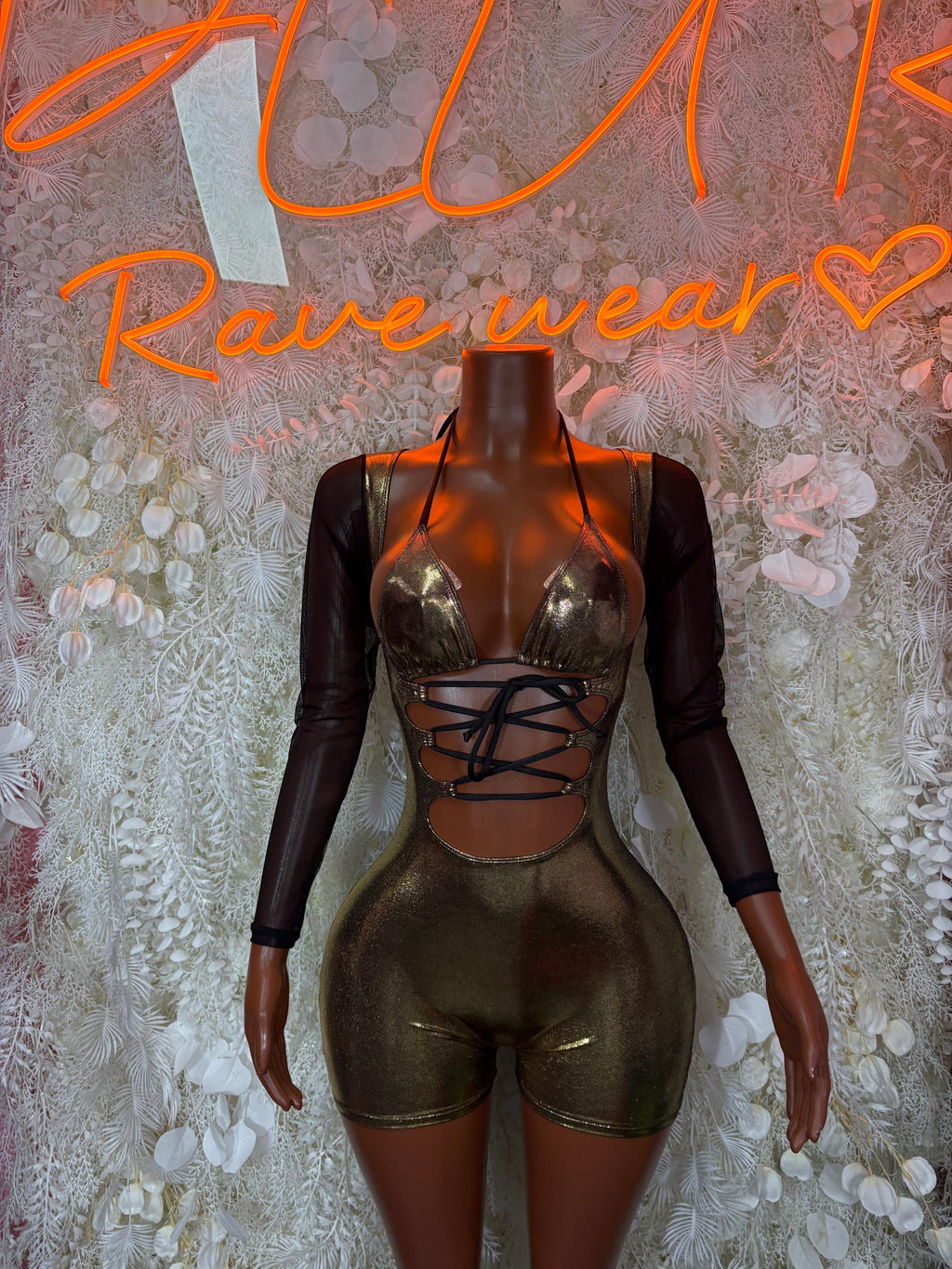 Gold metallic bodysuit with lace-up front cutout and sheer black sleeves