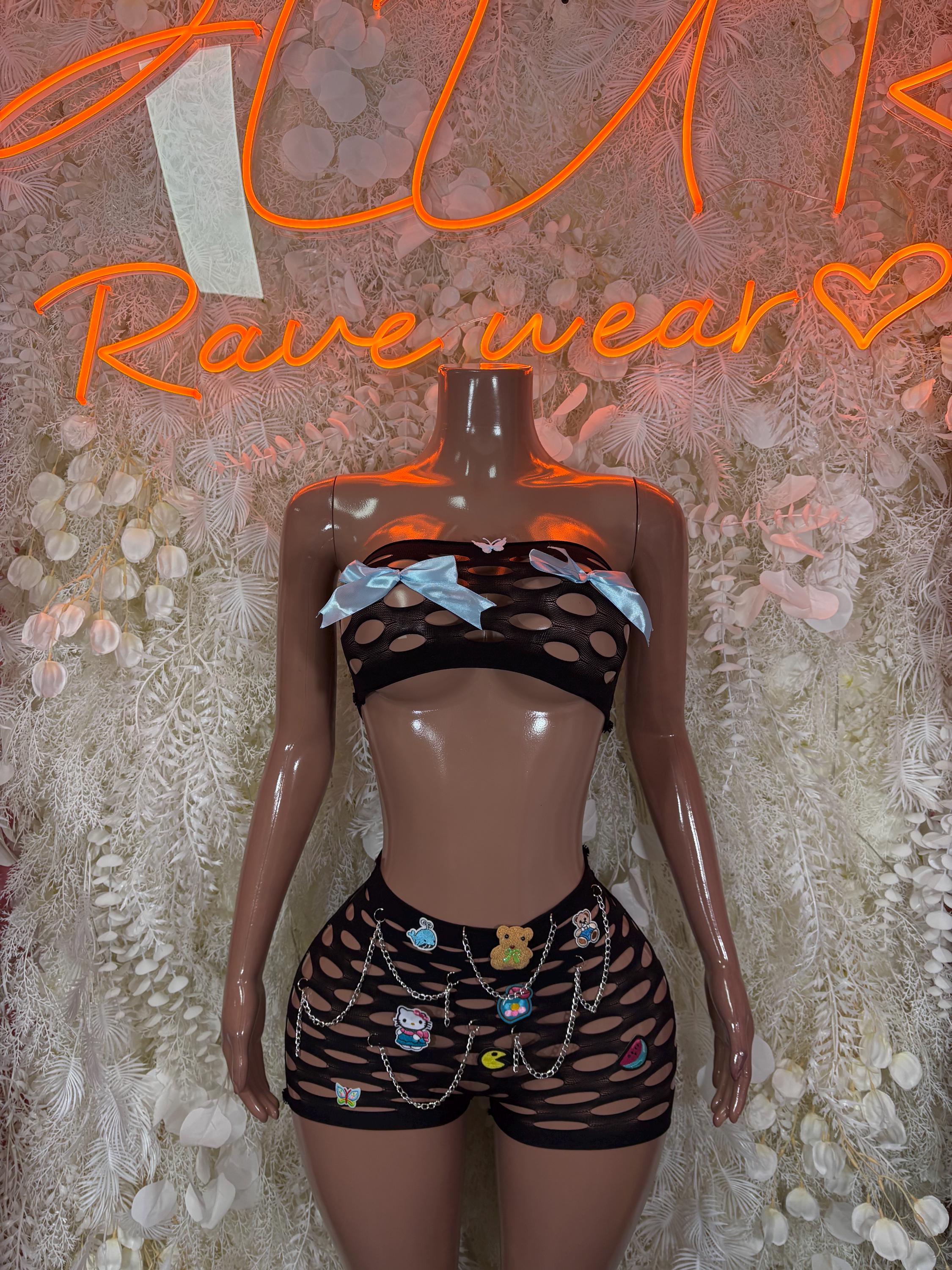 Black mesh two-piece festival set with strapless top and patterned high-cut shorts