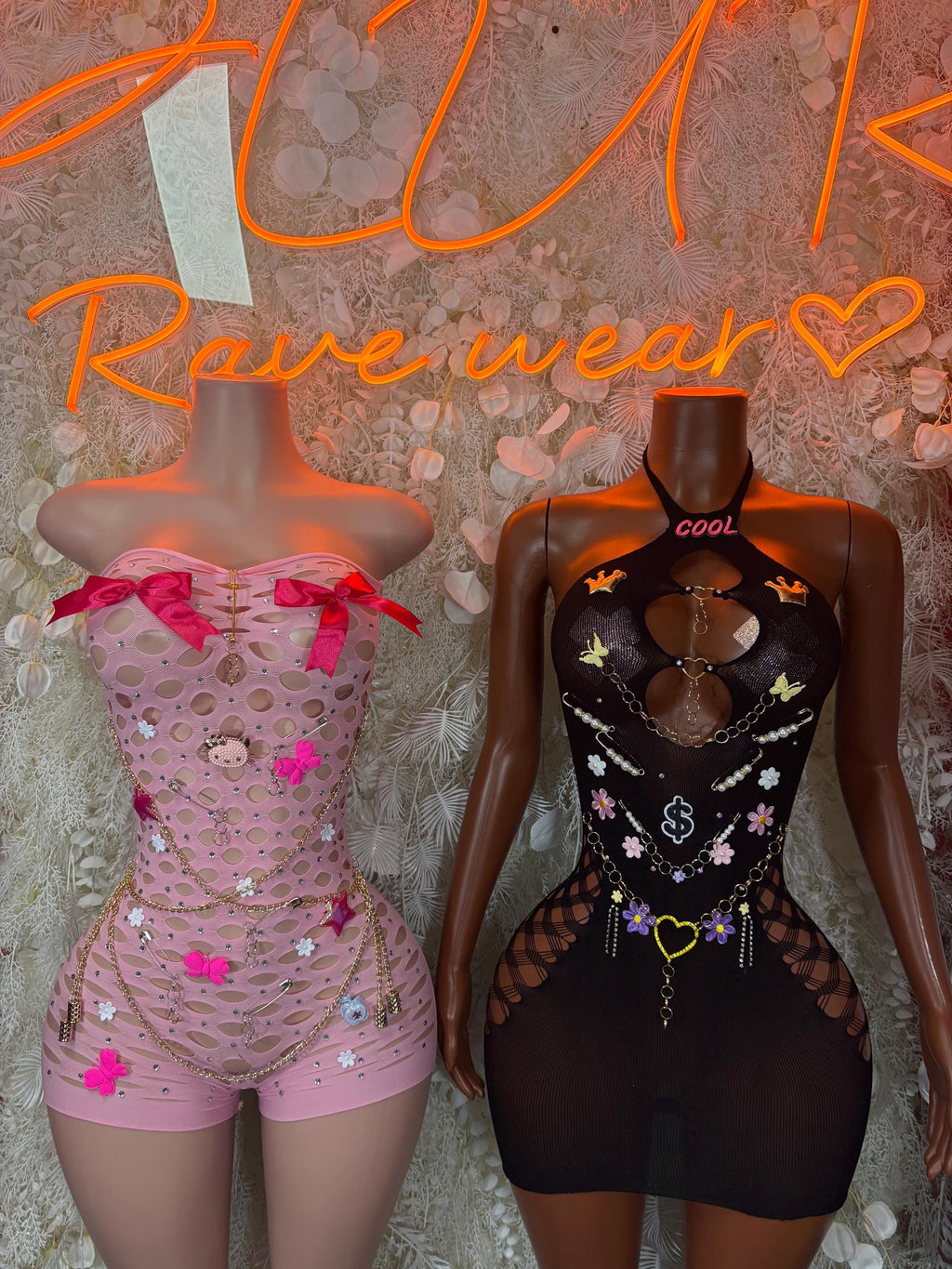 Pink and black fishnet bodysuit set, front views with heart and charm accents