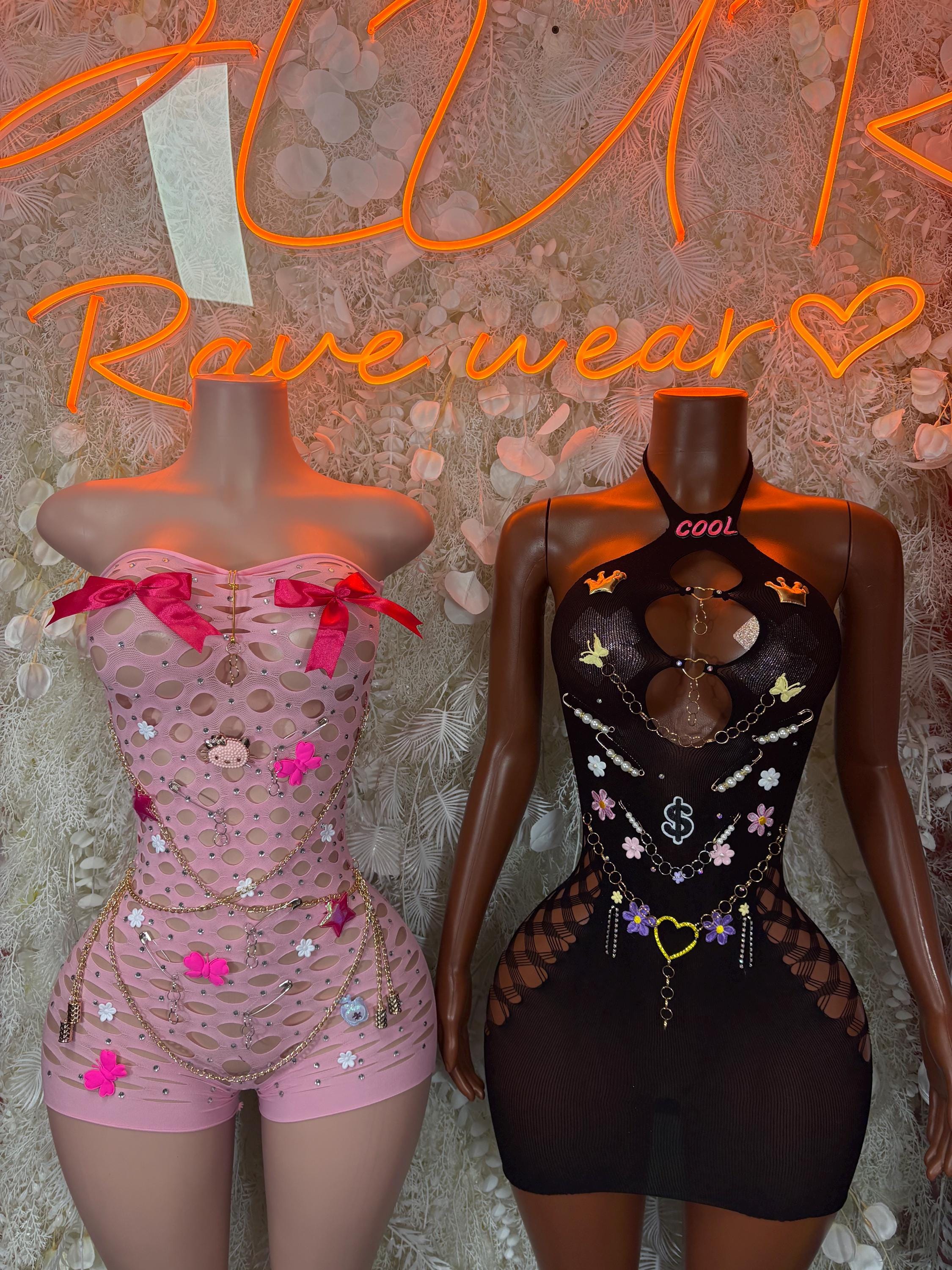 Pink and black fishnet bodysuit set, front views with heart and charm accents