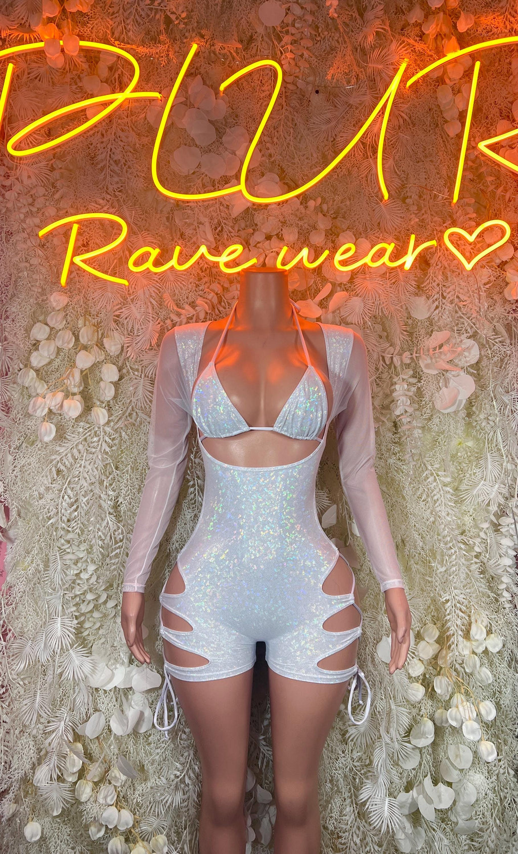 Metallic white bodysuit with long sleeves, heart front cutout and lace-up sides.