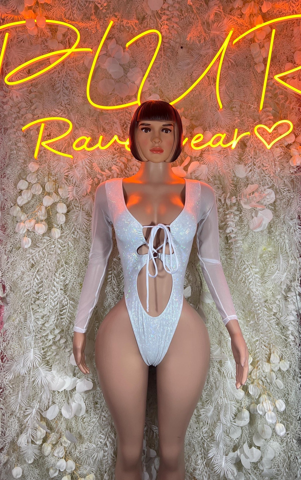 Crushed white metallic bodysuit, long sleeves with tie-front and thong cutout