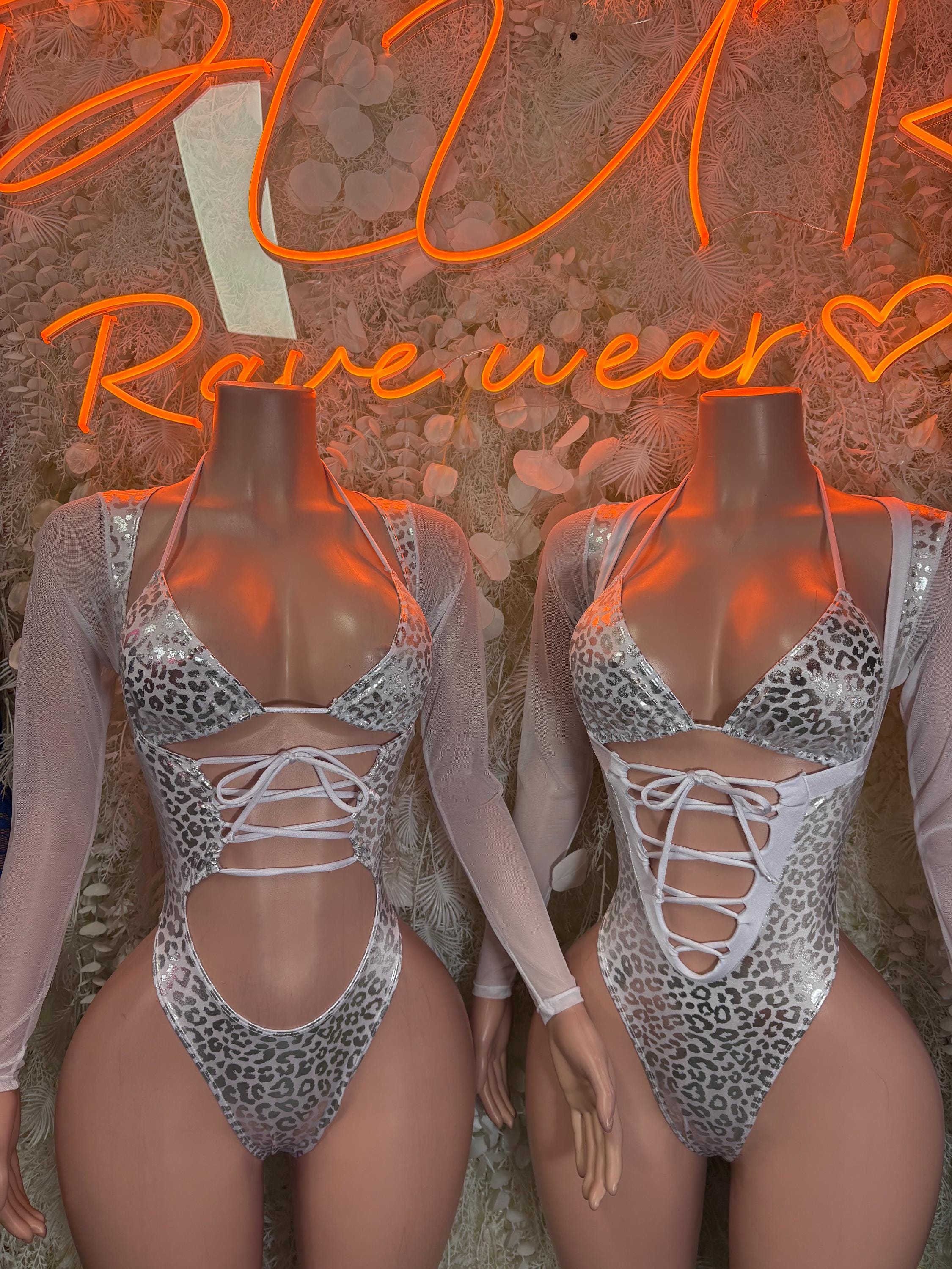 Holographic silver cheetah print rave bodysuit with lace-up chest and center cutout