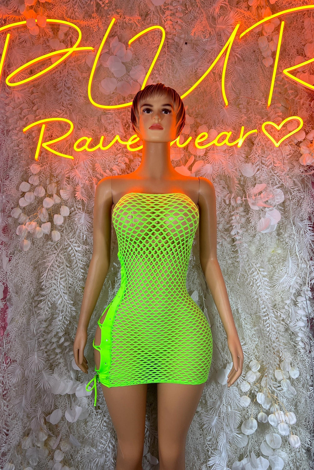 Neon green fishnet mini dress, strapless, with side drawstrings