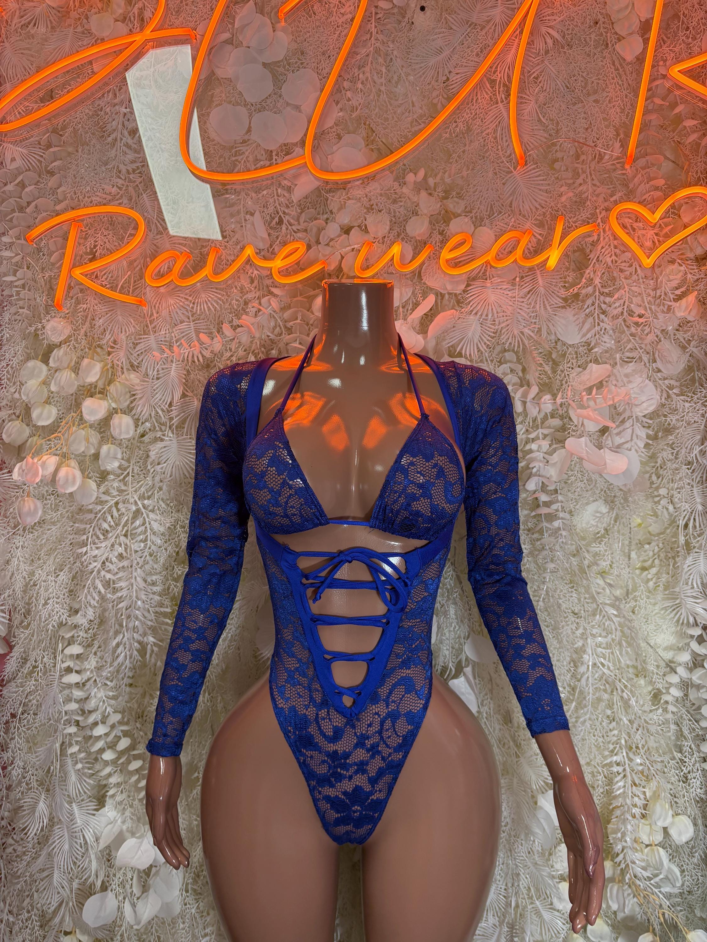 Blue lace bodysuit with long sleeves, lace-up front, and high-cut legs