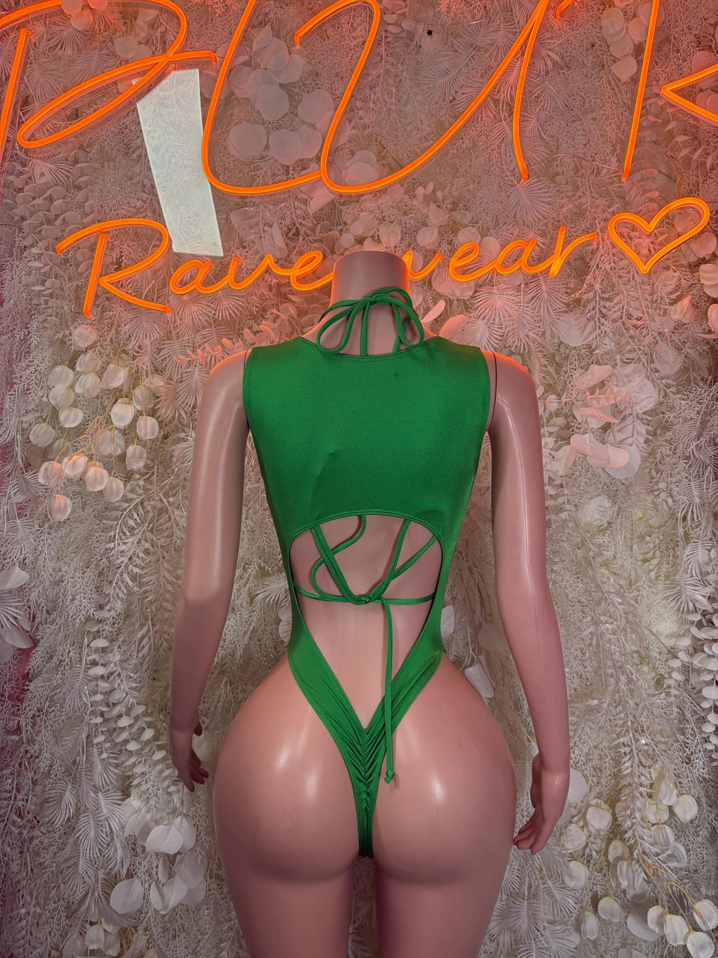 Green striped thong bodysuit with crisscross lace-up back and halter straps