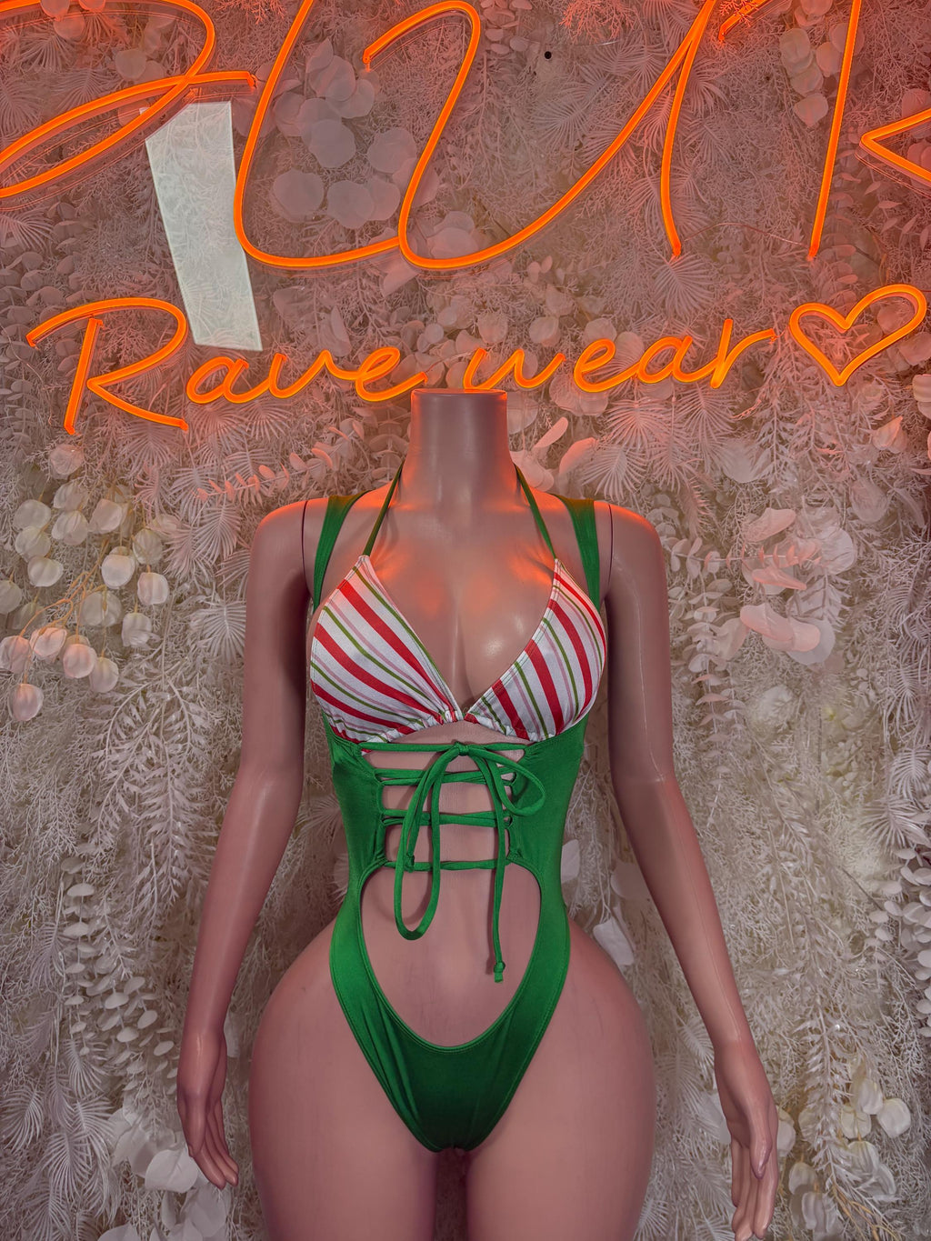 Green striped thong-style bodysuit with triangle cups and lace-up front