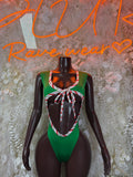 Green Christmas bodysuit with striped bib and candy-cane bow front, sleeveless