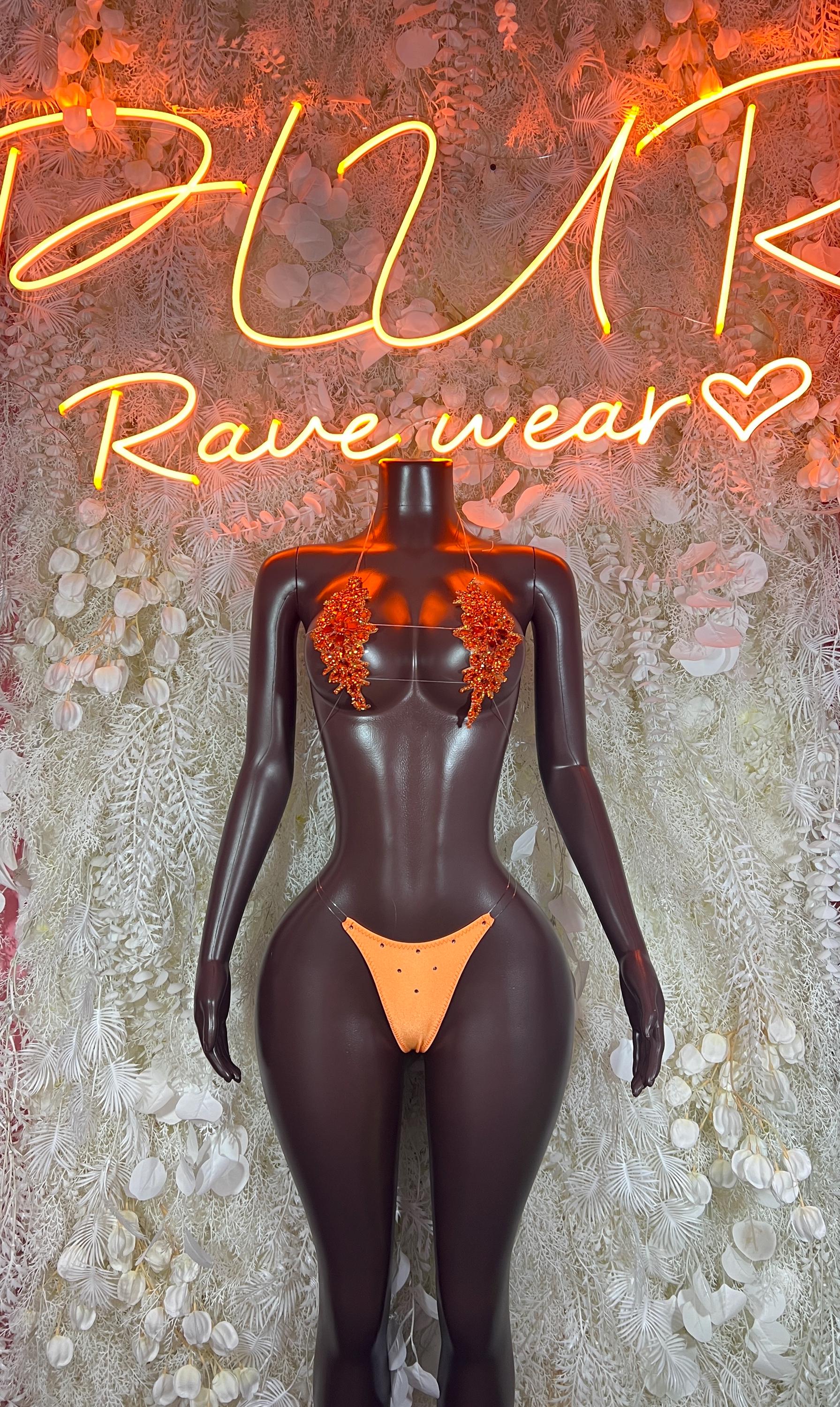 Black glossy bodysuit with orange rhinestone triangle bra and V-cut bikini bottom