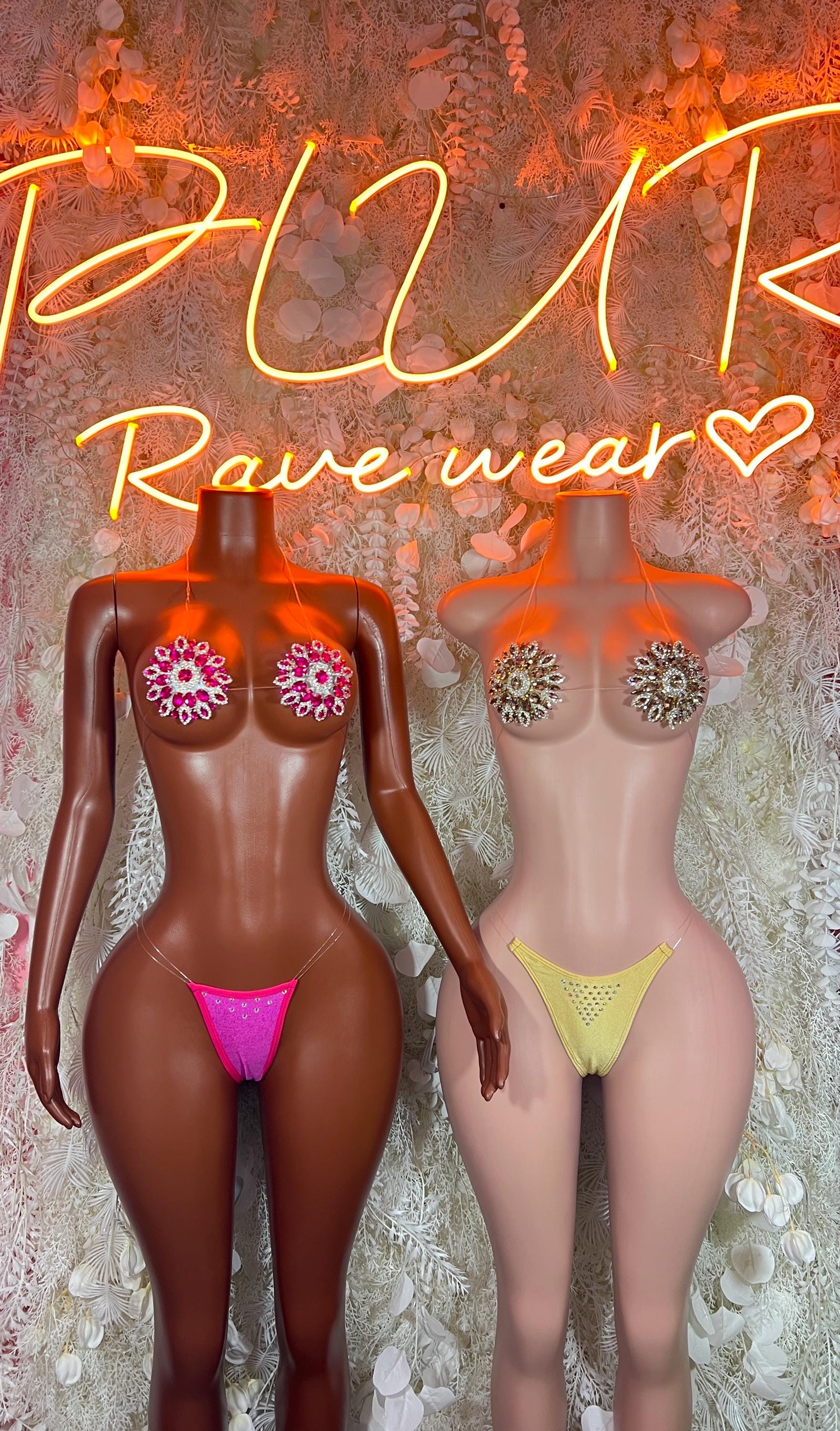 Rhinestone bikini set pair on mannequins, pink and yellow jeweled triangle tops and bottoms