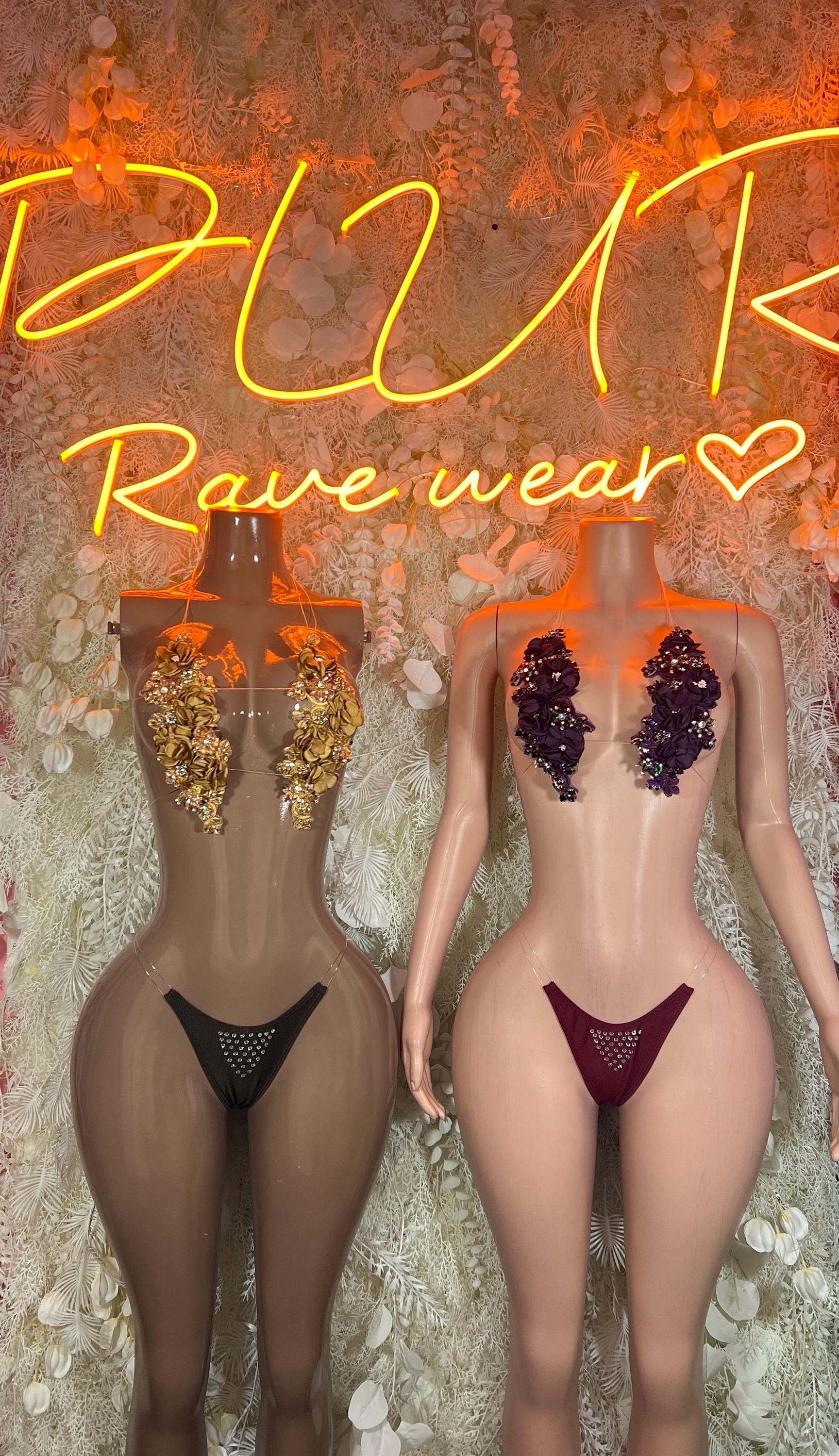 Two rhinestone floral bikini sets: gold and dark purple triangle tops with bottoms