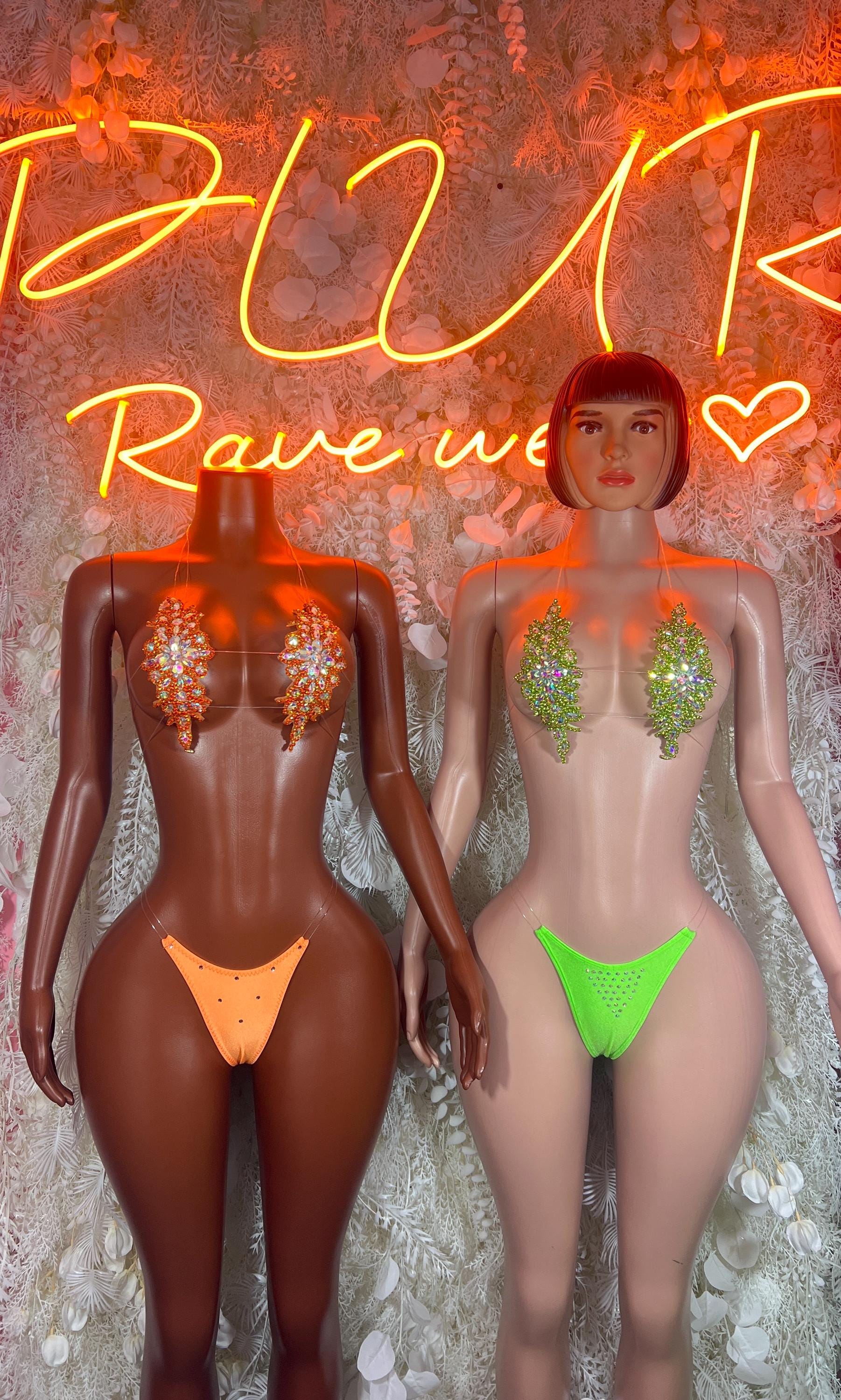Green rhinestone bikini set on model, triangle bra and matching triangle bottoms.